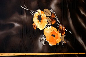 Bi-elastischer Badestoff, Coupon, dkl. braun mit orangen Blumen